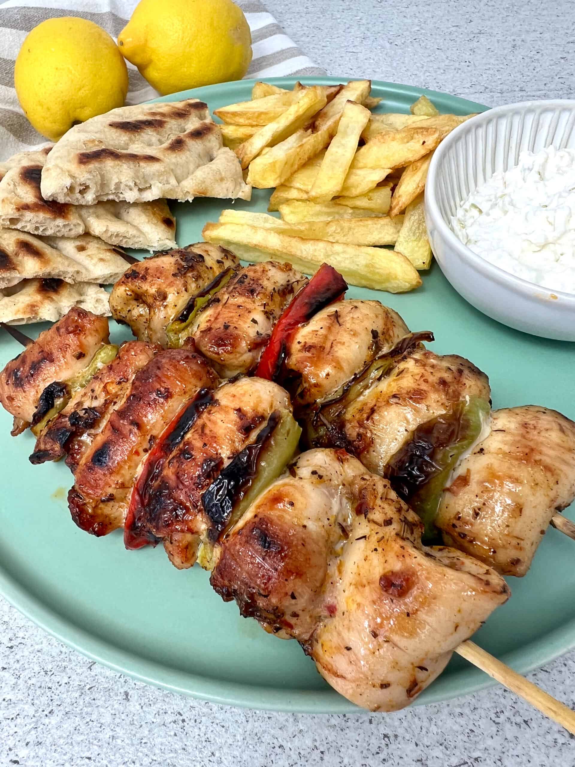 Greek chicken souvlaki skewers with pita